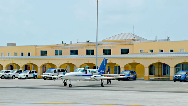 Henry E. Rohlsen Airport St. Croix with travel documents for golf vacation planning